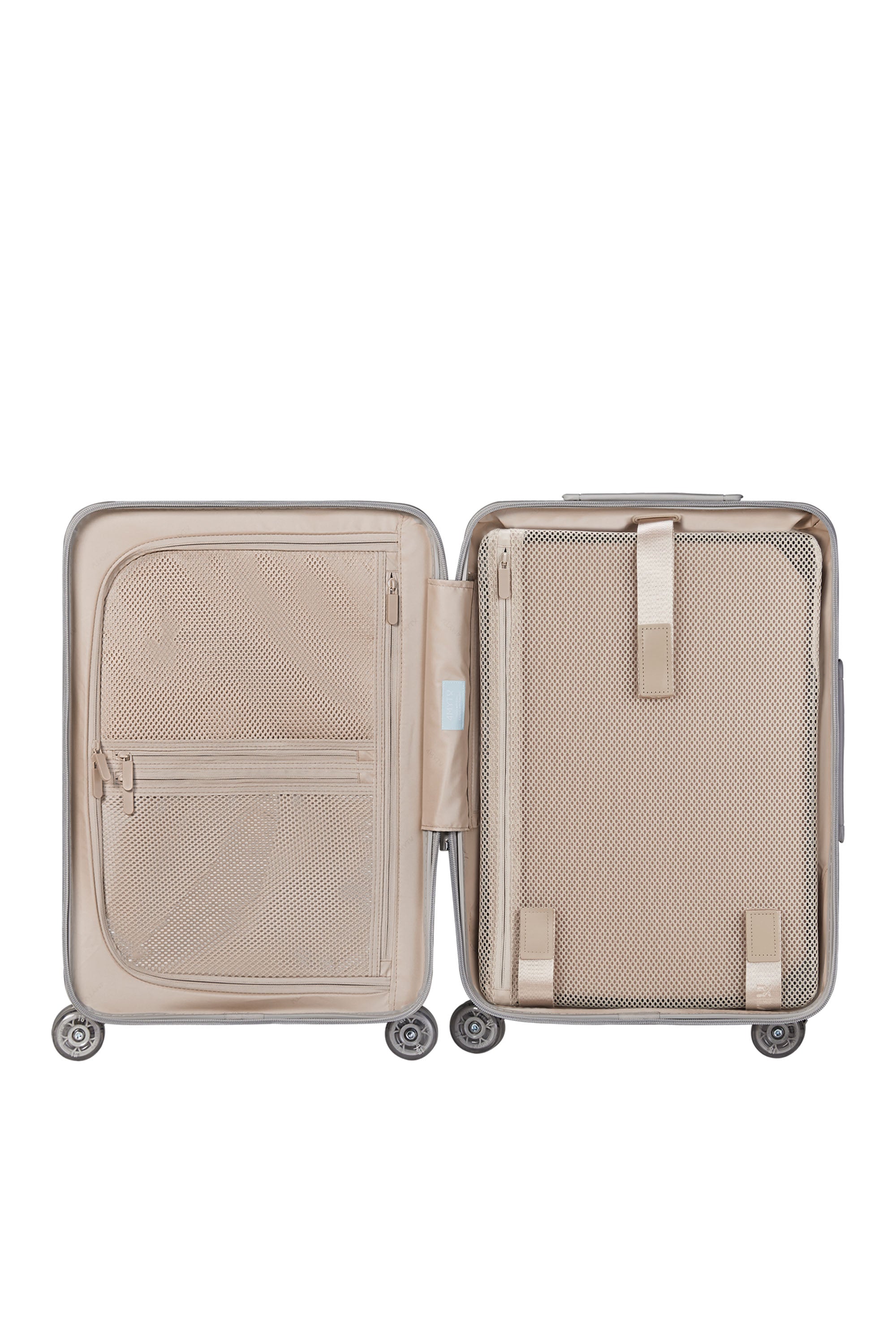 Interior view of Aspen Green Bigger Carry-On luggage with mesh compartments