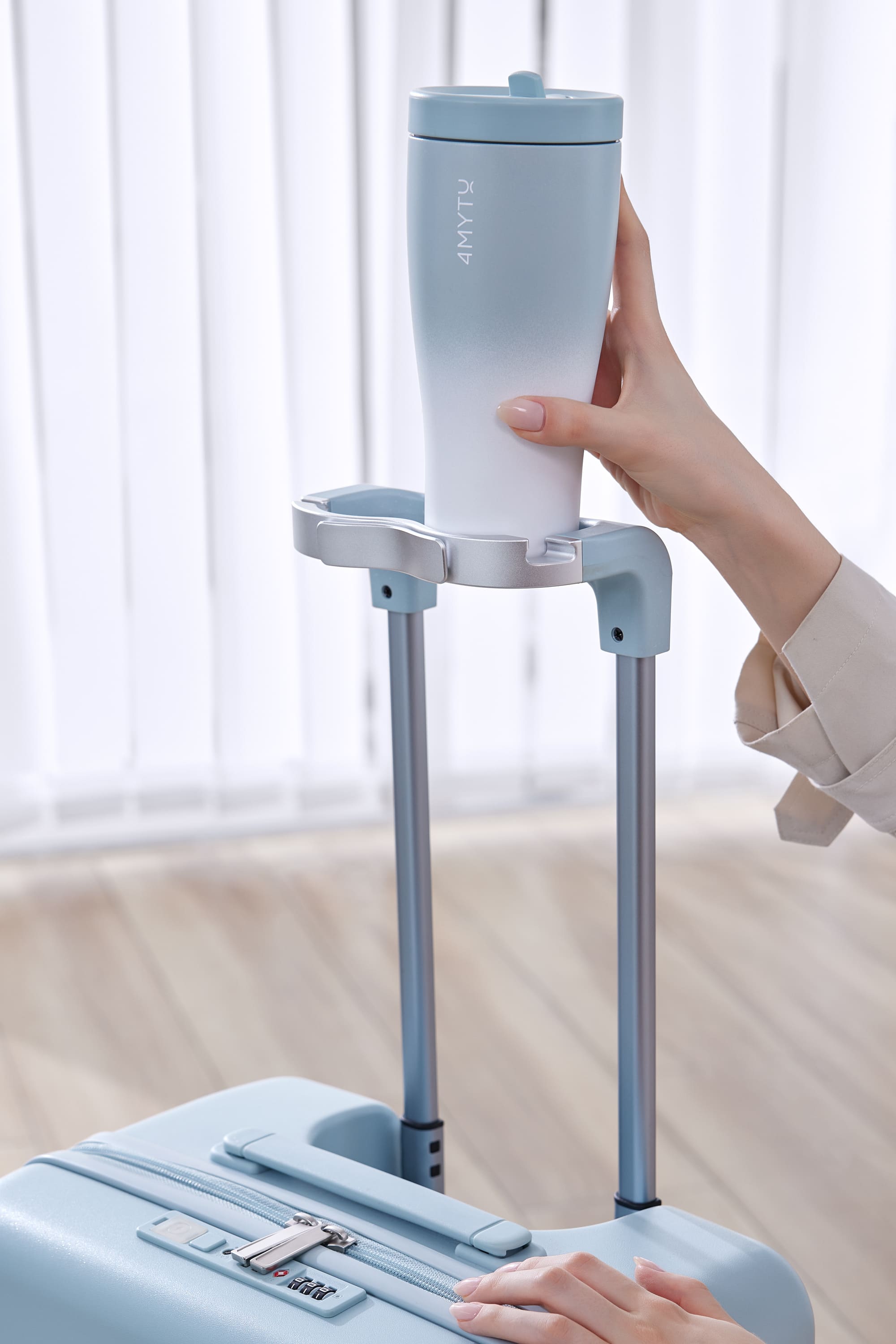 Innovative mint green carry-on suitcase with a cup holder from 4MYTU collection