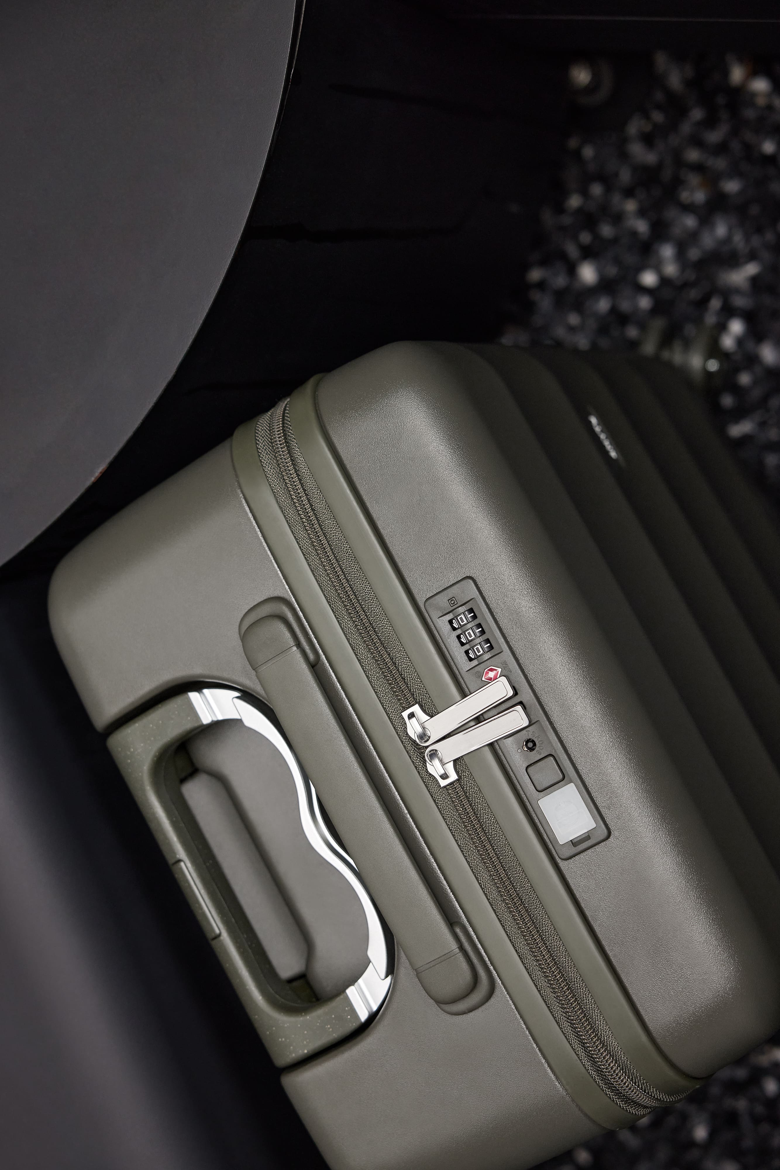 Aspen Green Bigger Tank Carry-On suitcase with TSA locks and sleek design.